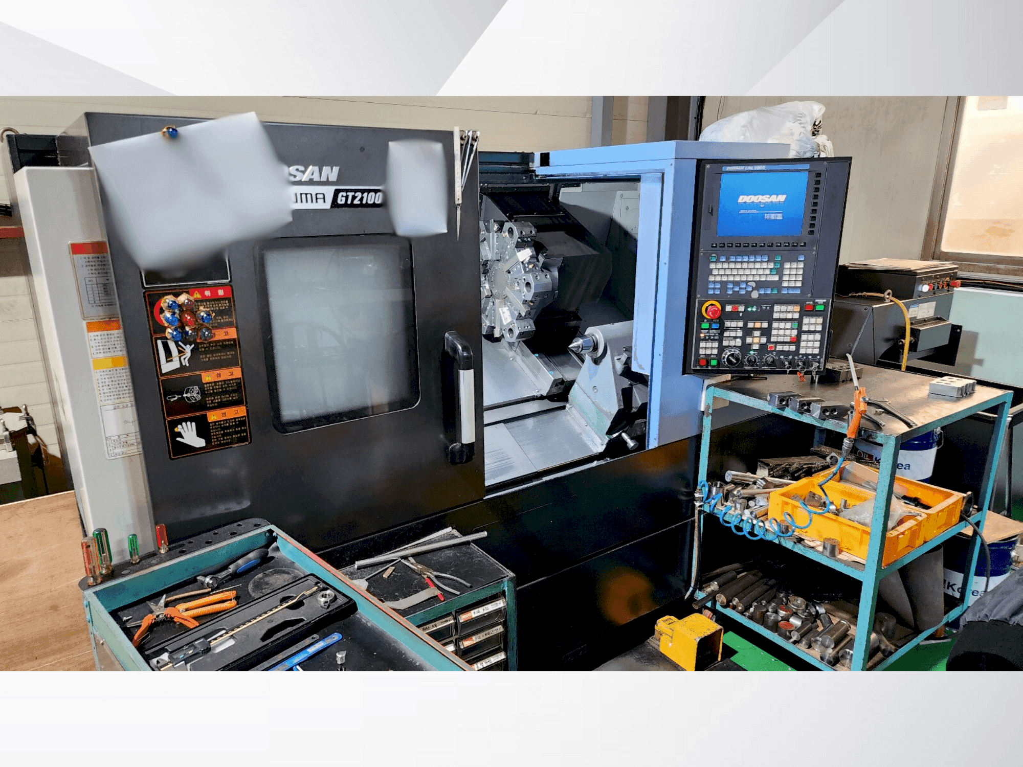 Koneen DOOSAN PUMA GT2100 etunäkymä