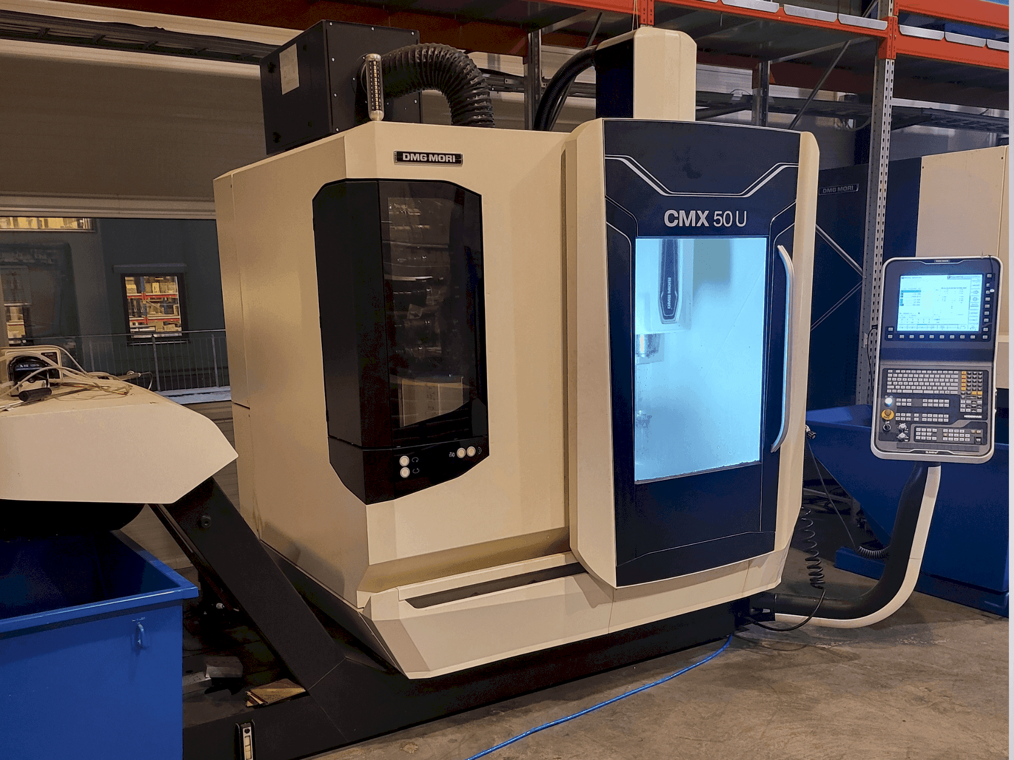 Koneen DMG MORI CMX 50U etunäkymä