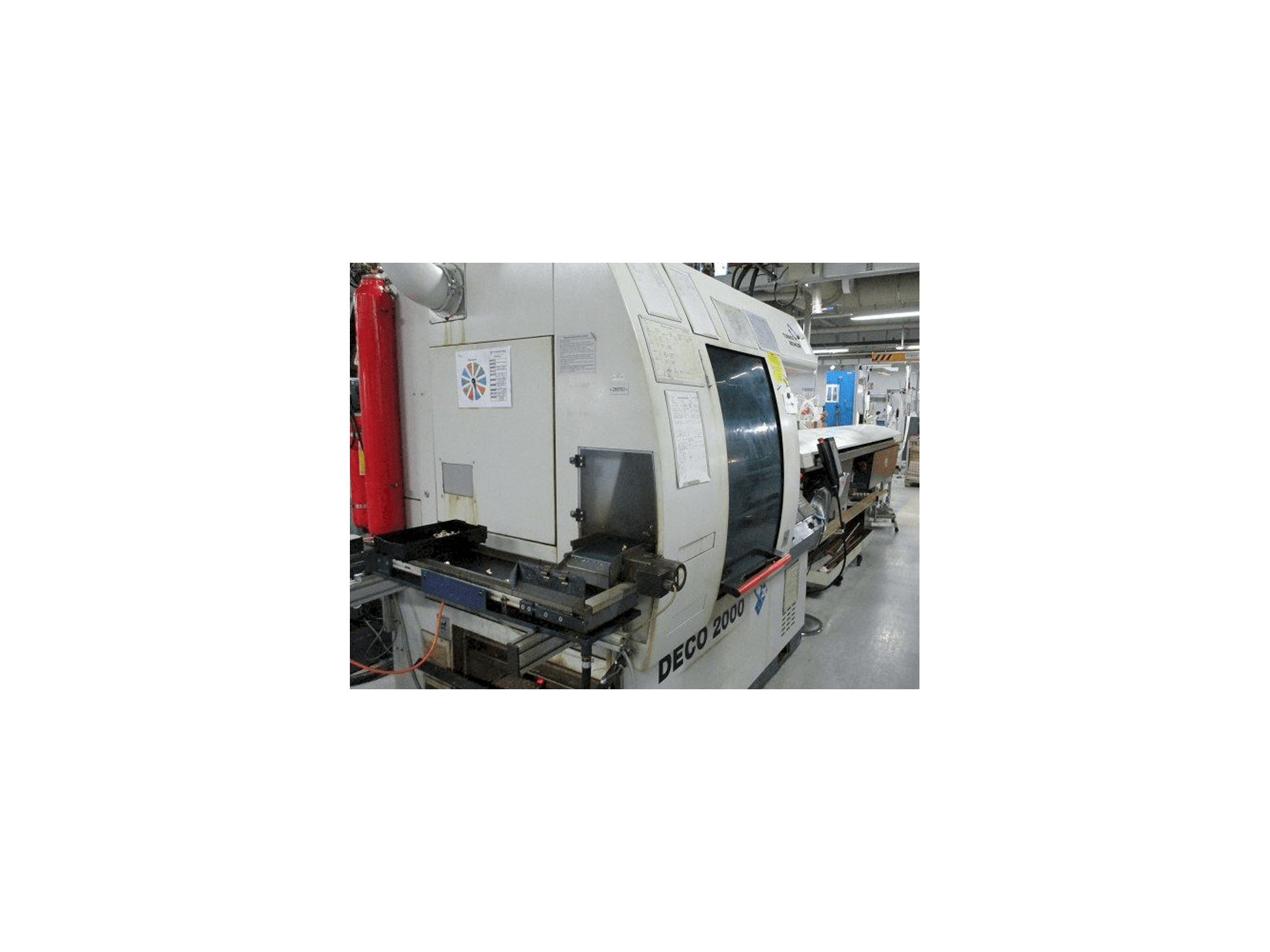 Koneen Tornos-Bechler DECO 20 vasemman sivun näkymä