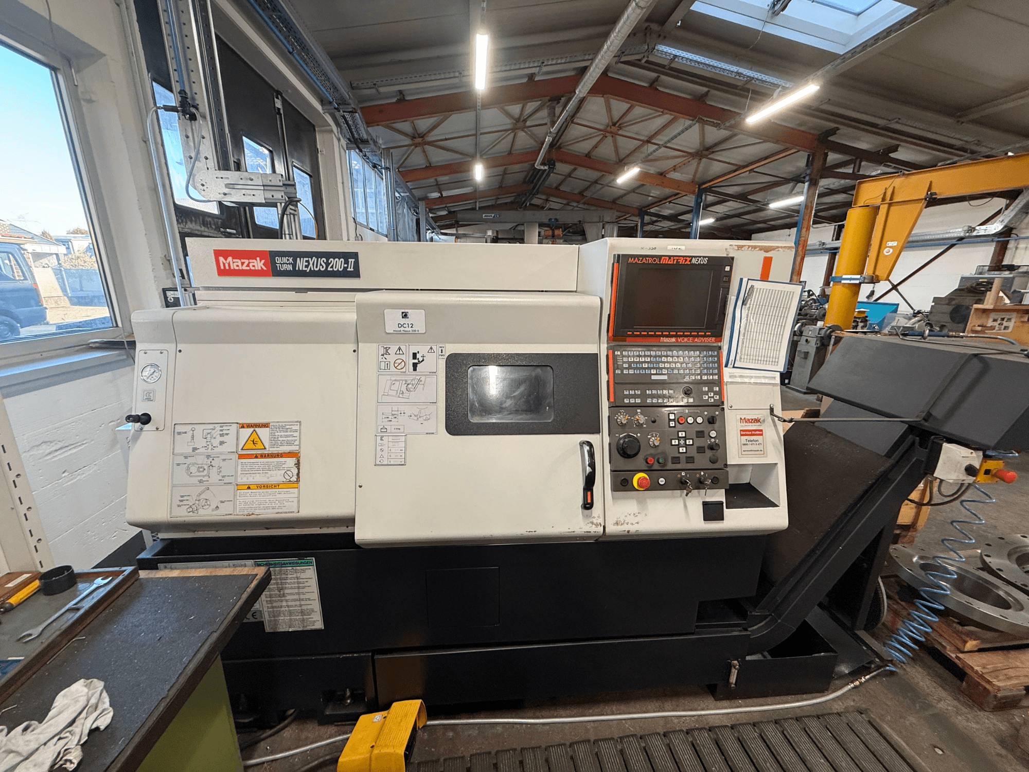 Mazak QUICK TURN NEXUS 200-II -vaakasuora sorvi, etunäkymä, jossa näkyvät ohjauspaneeli ja käyttöominaisuudet.