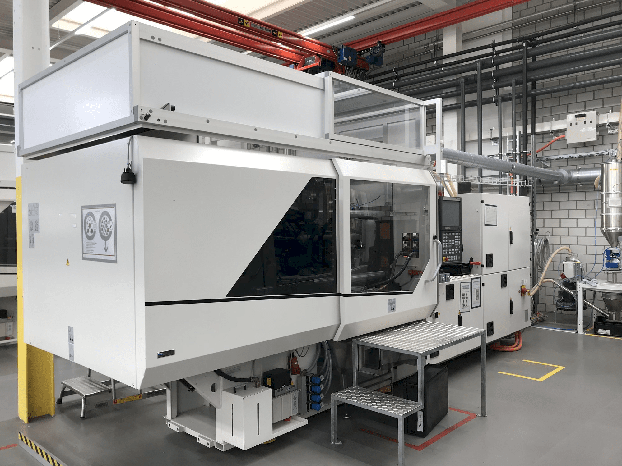 Koneen Sumitomo Demag EL-EXIS SP 150/500-475 vasemman sivun näkymä