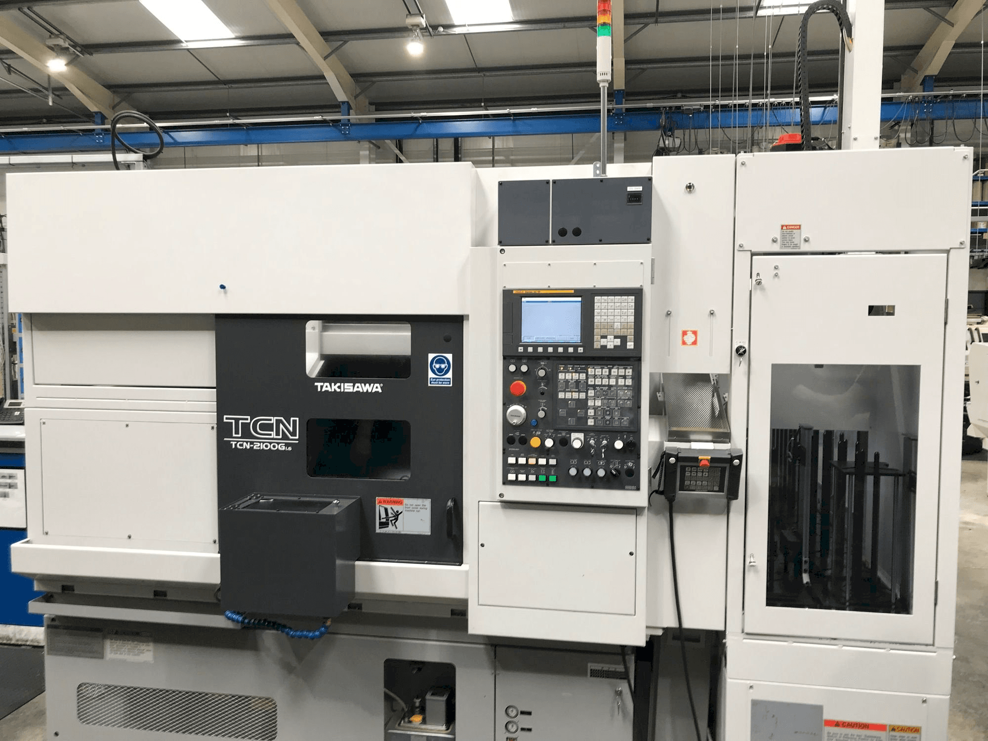 Koneen Takisawa TCN-2100G L6 etunäkymä