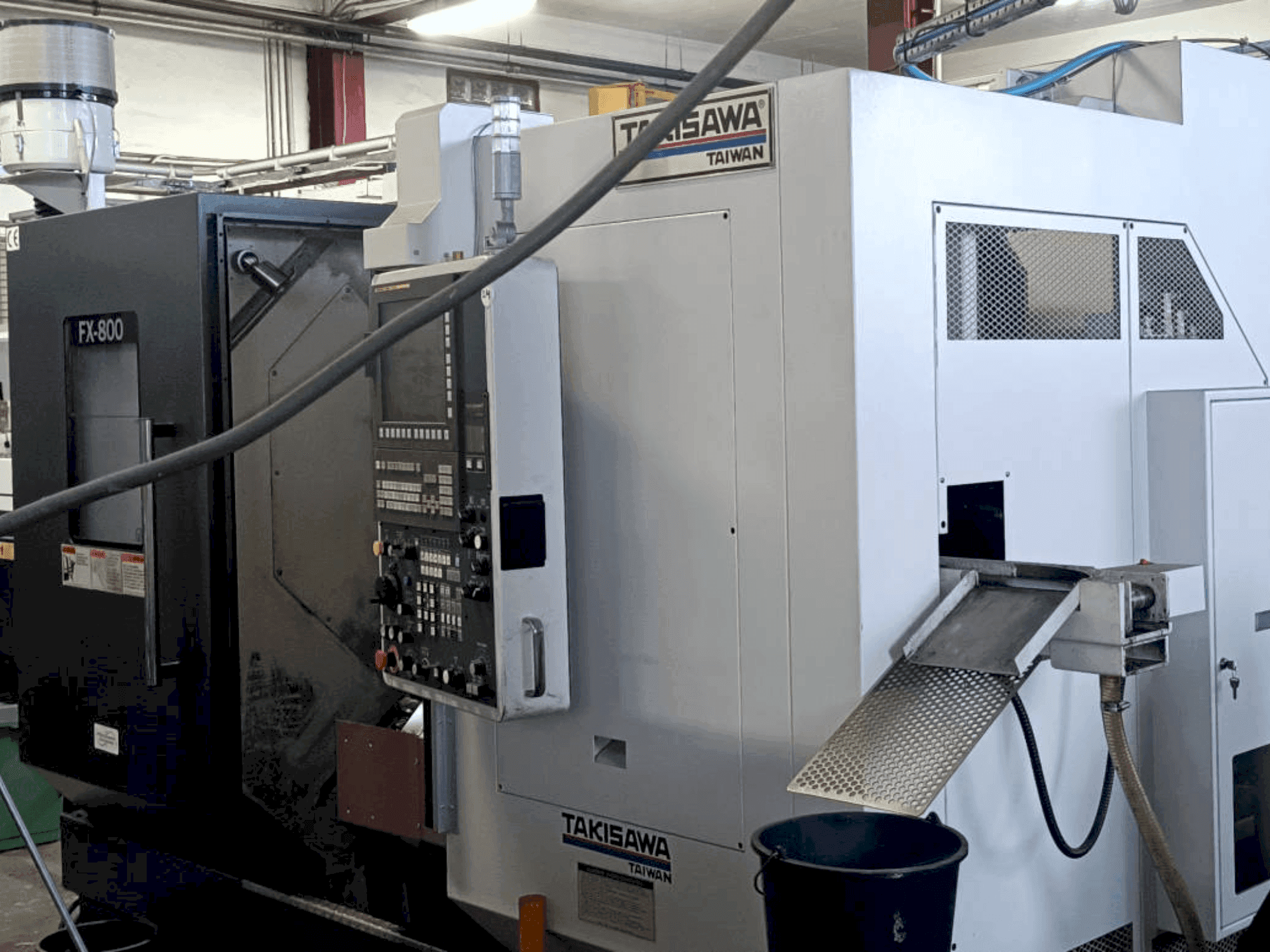 Koneen Takisawa FX800 etunäkymä