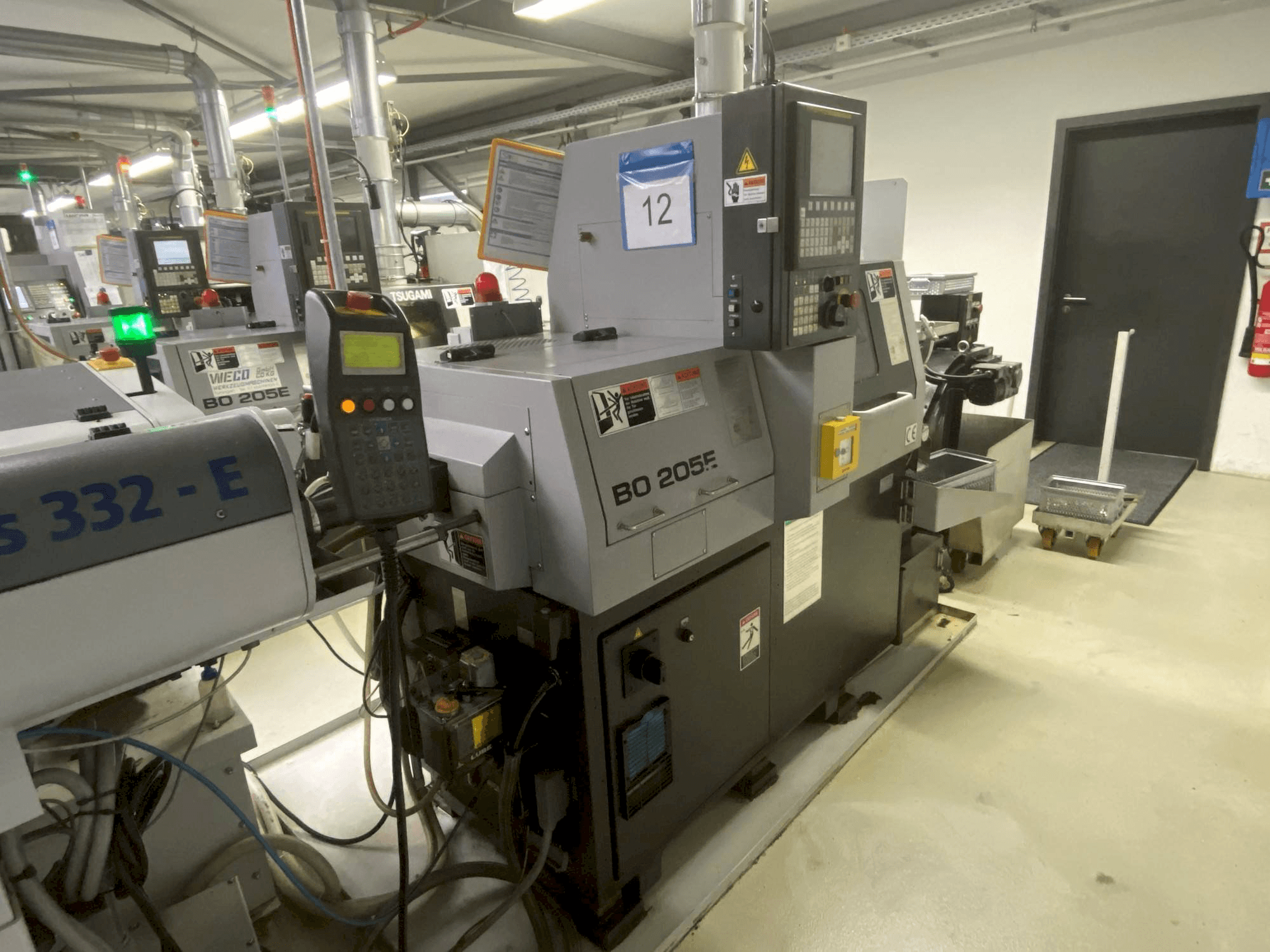 Koneen TSUGAMI Bo205 Eii etunäkymä