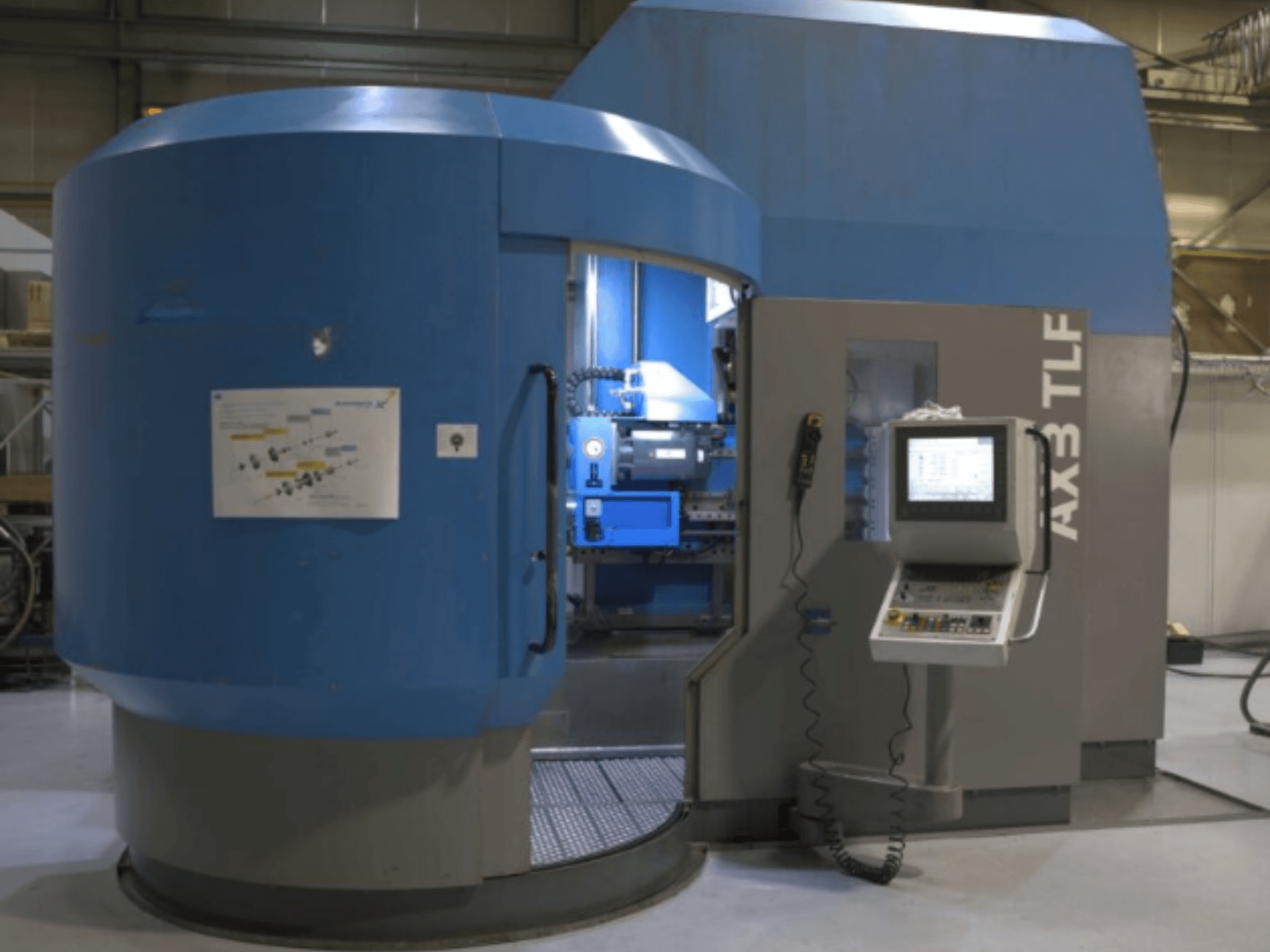 Porakone IXION Auerbach IA2 TLF-1200.4 edestä; ohjauspaneeli ja sininen kotelo.