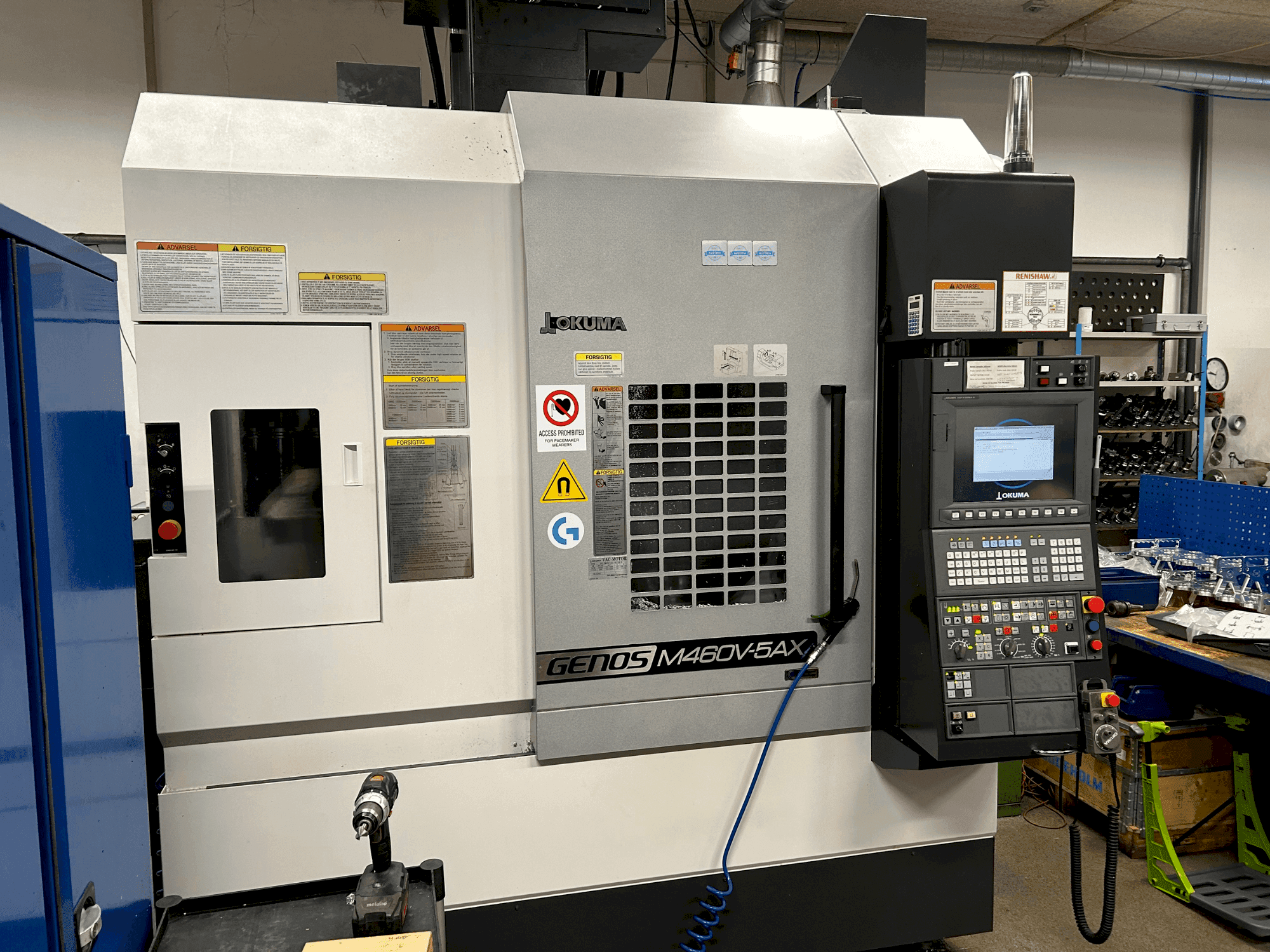 Koneen Okuma GENOS M460V-5AX etunäkymä