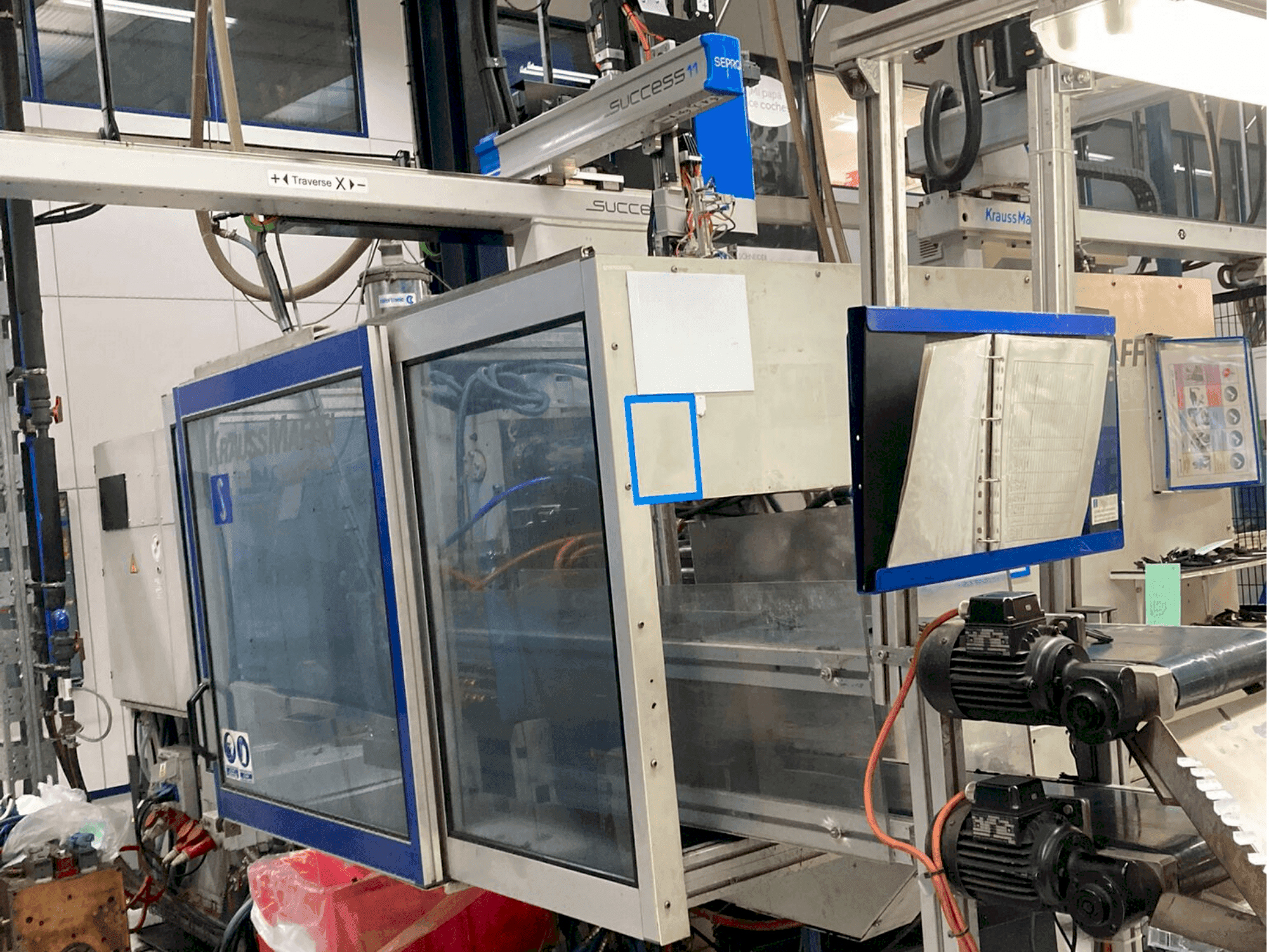 Koneen Krauss Maffei 150-700 C2 etunäkymä