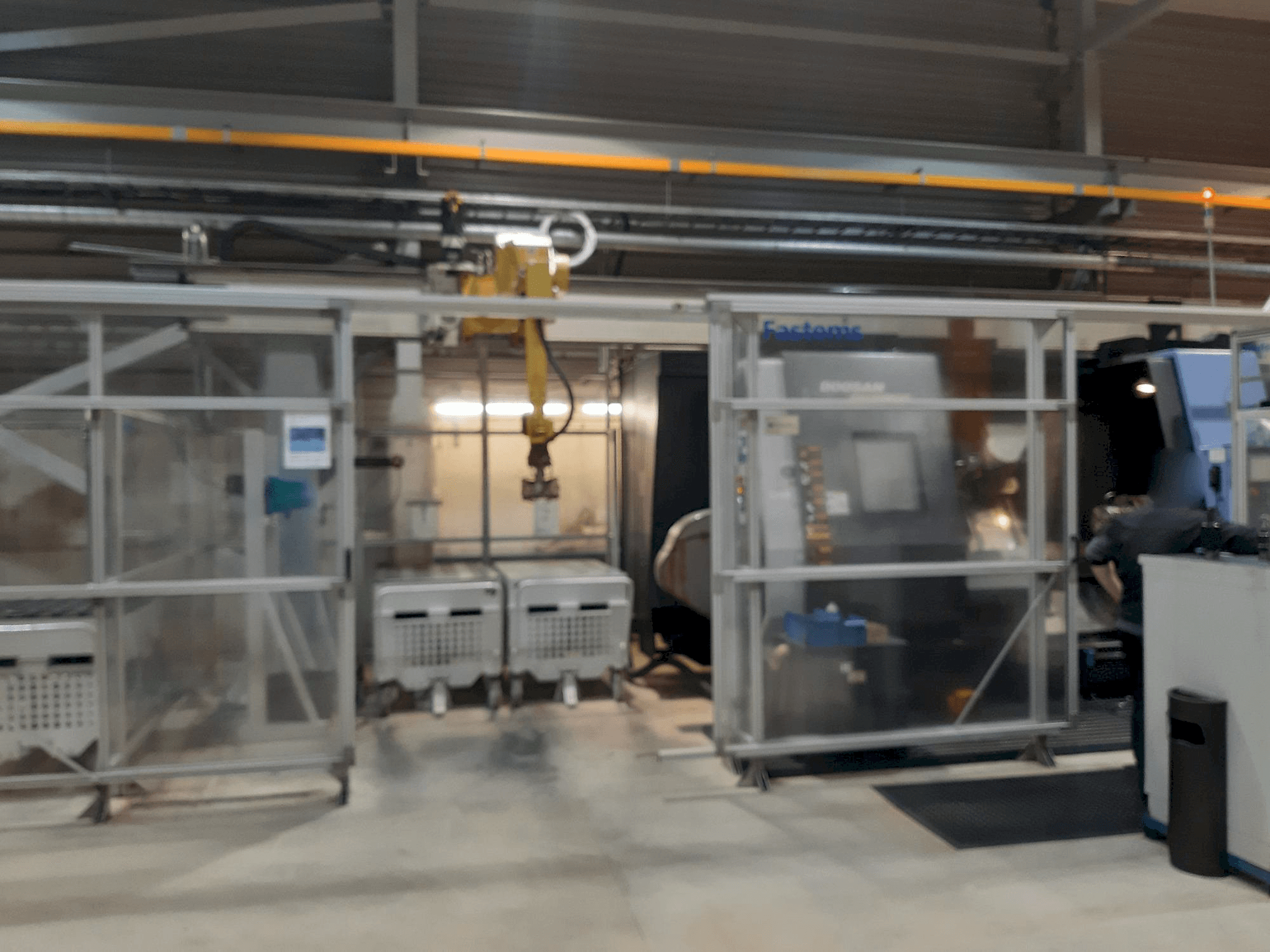 Koneen Fastems RPC-70 with Fanuc M-710iC etunäkymä