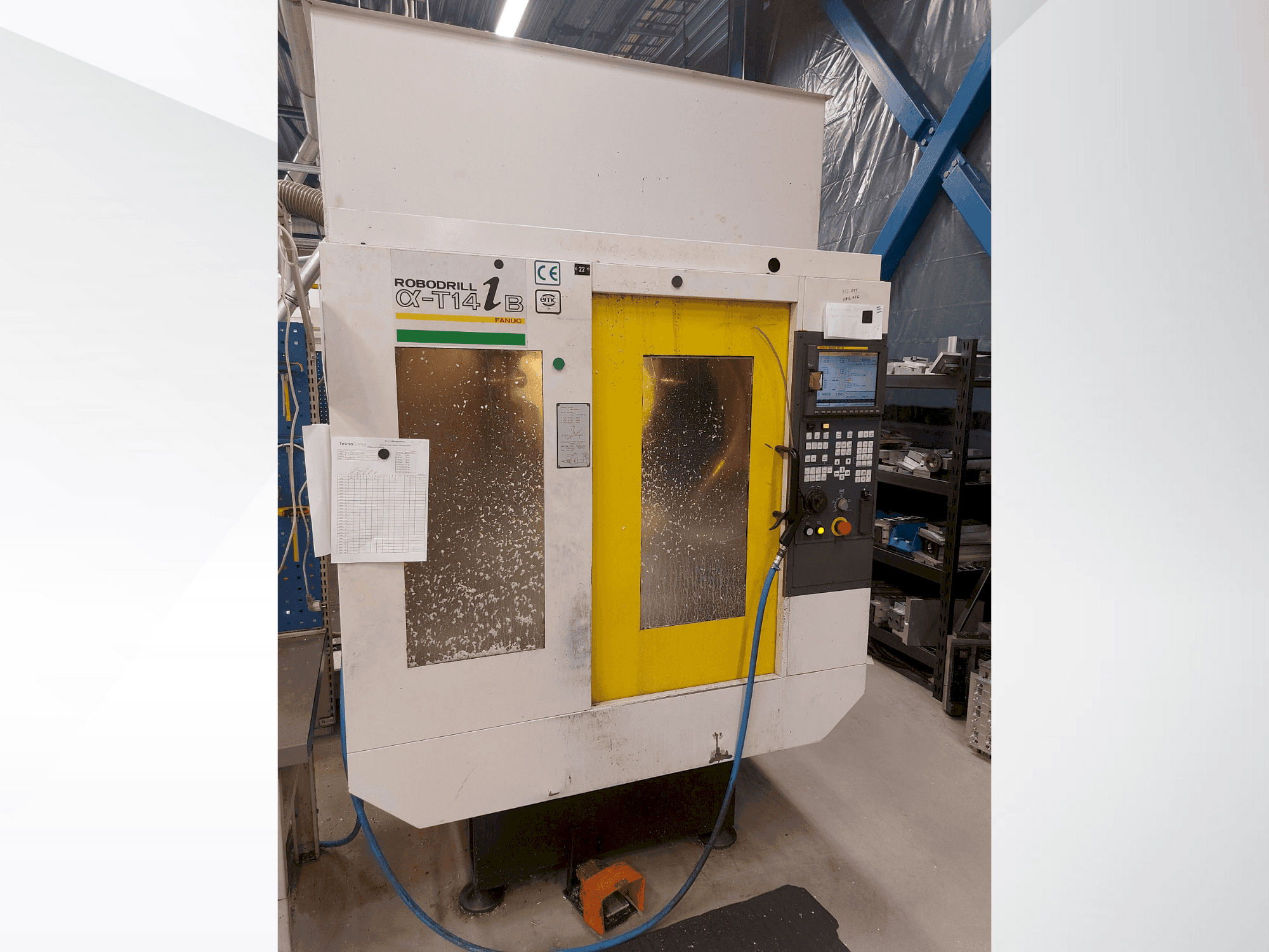 Koneen FANUC Robodrill α-T14iB etunäkymä